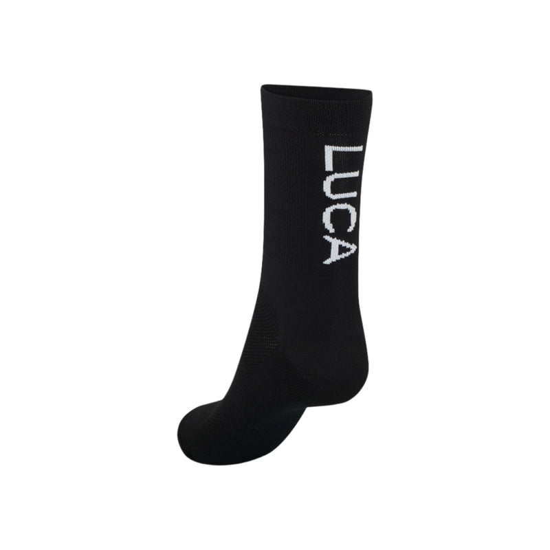 The-black-ankle-socks-with-the-LUCA-text-and-the-black-two-strap-slide-sandals-
