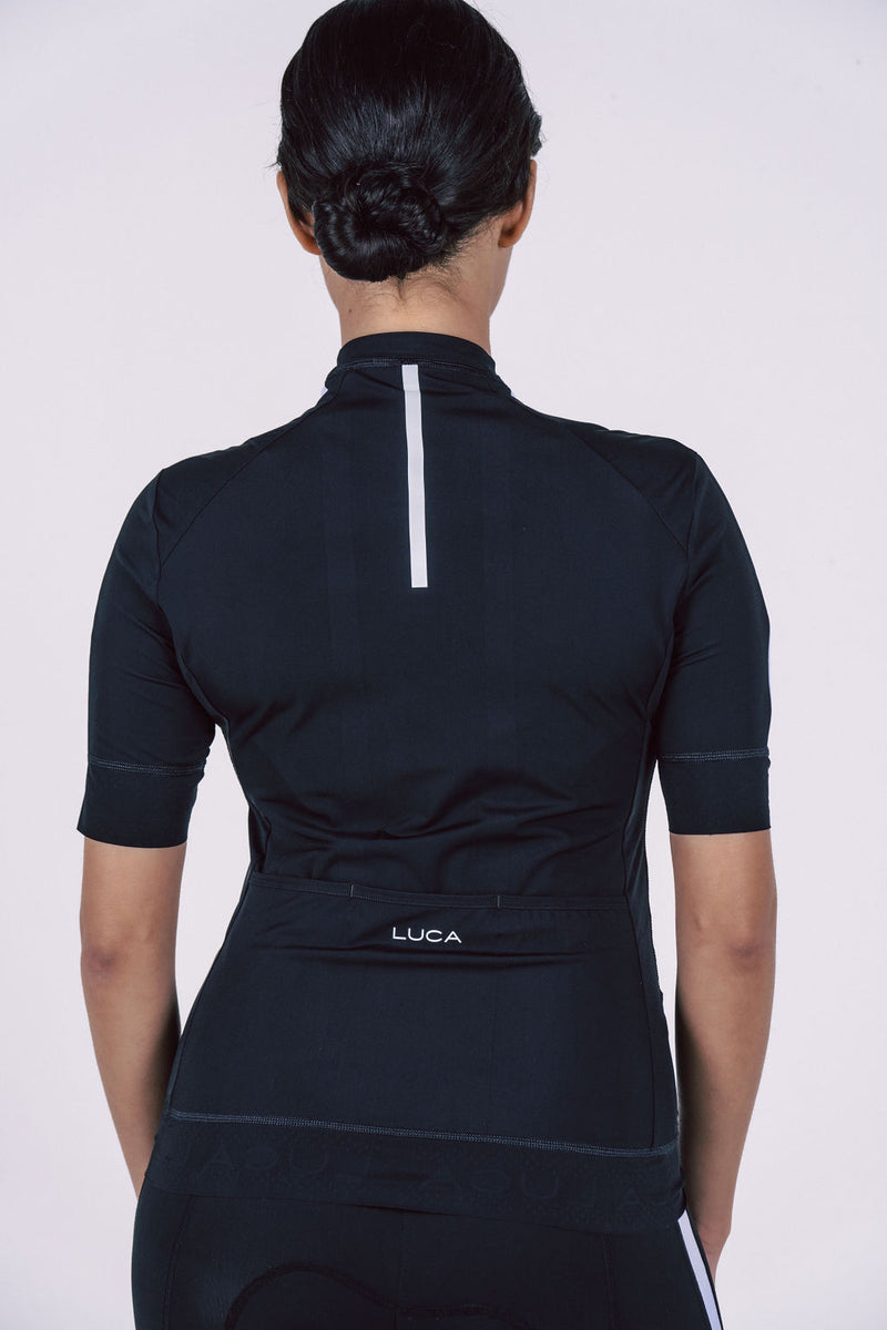 Black-cycling-jersey-with-front-zip- and-white-side-stripes-on-the-sleeves-and-shoulder-worn-by-a- model