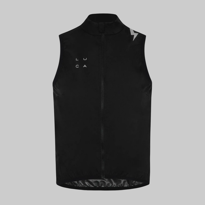 Cyclist wearing LUCA Breeze Gilet in black with cycling jersey, outdoor side view
